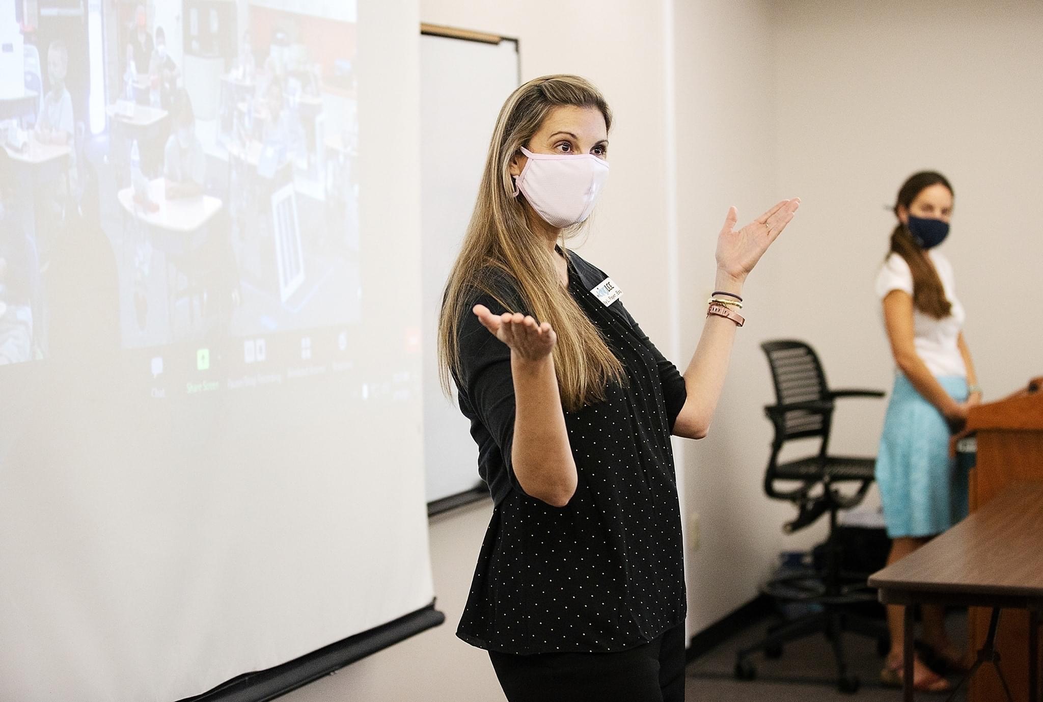 Kelly speaks with students