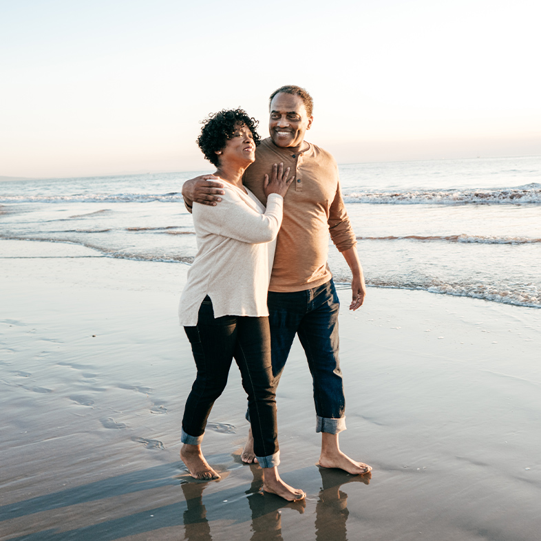 Couple walking on the beach